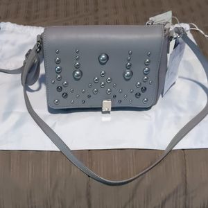 Small purse with shoulder strap, nine west ,never used , tags attached